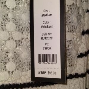 Romeo and Juliet Couture.  Open shoulder long sleeve lace/cotton Blouse size M